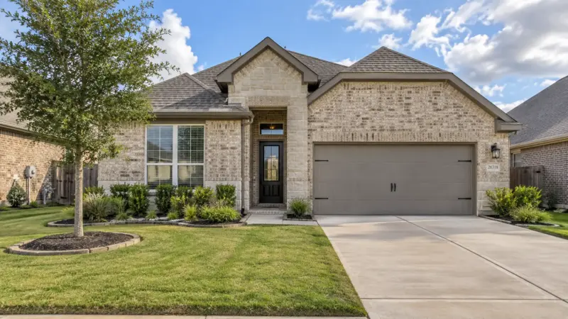 An exterior view of a home in Katy, Texas which is well maintained and captures the importance of the surrounding neighborhood for investment properties