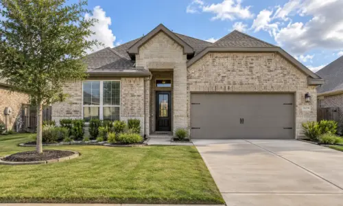 An exterior view of a home in Katy, Texas which is well maintained and captures the importance of the surrounding neighborhood for investment properties