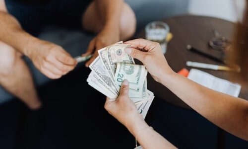 person counting cash